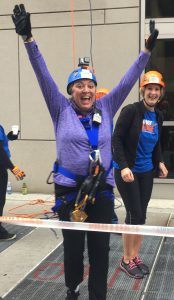 Photo of Monica Gould after rappelling