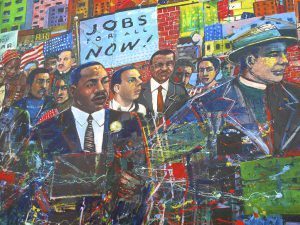 Mural of Martin Luther King Jr with a sign that reads Jobs for all now