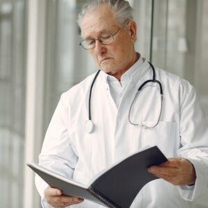 Doctor looking at chart