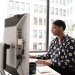 woman working at office computer