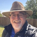 Headshot of coach John