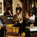 meeting of adults with one speaking