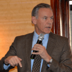 Jack Kendal speaking on stage