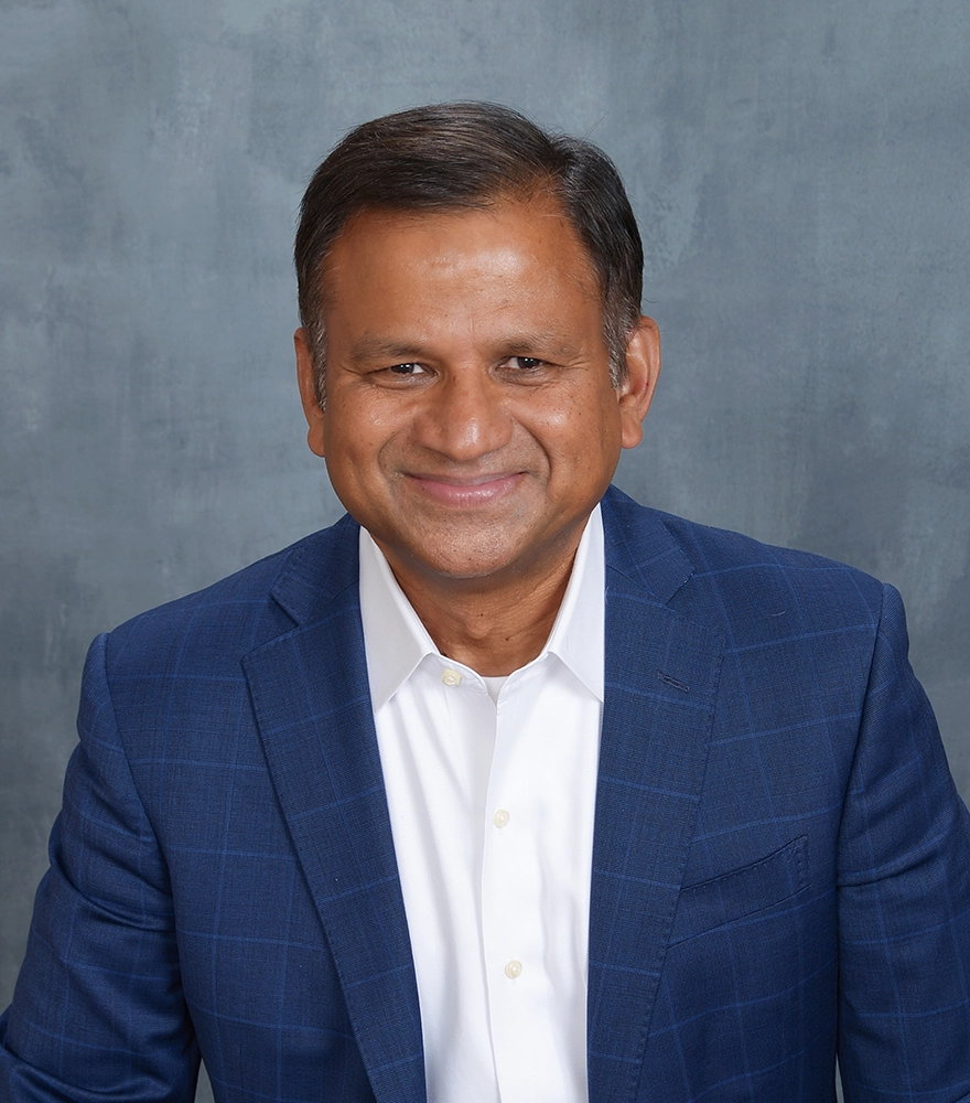 coach vinod jain smiling